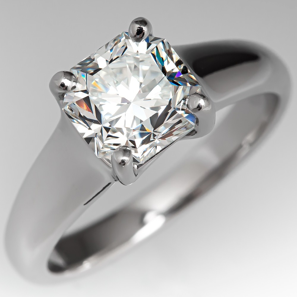 Would you pick a Tiffany Setting 1ct or a Cartier 0.7ct 1895 engagement ring  (if don't consider 4c)? Cartier has been my dream but we have a budget on  the engagement ring.