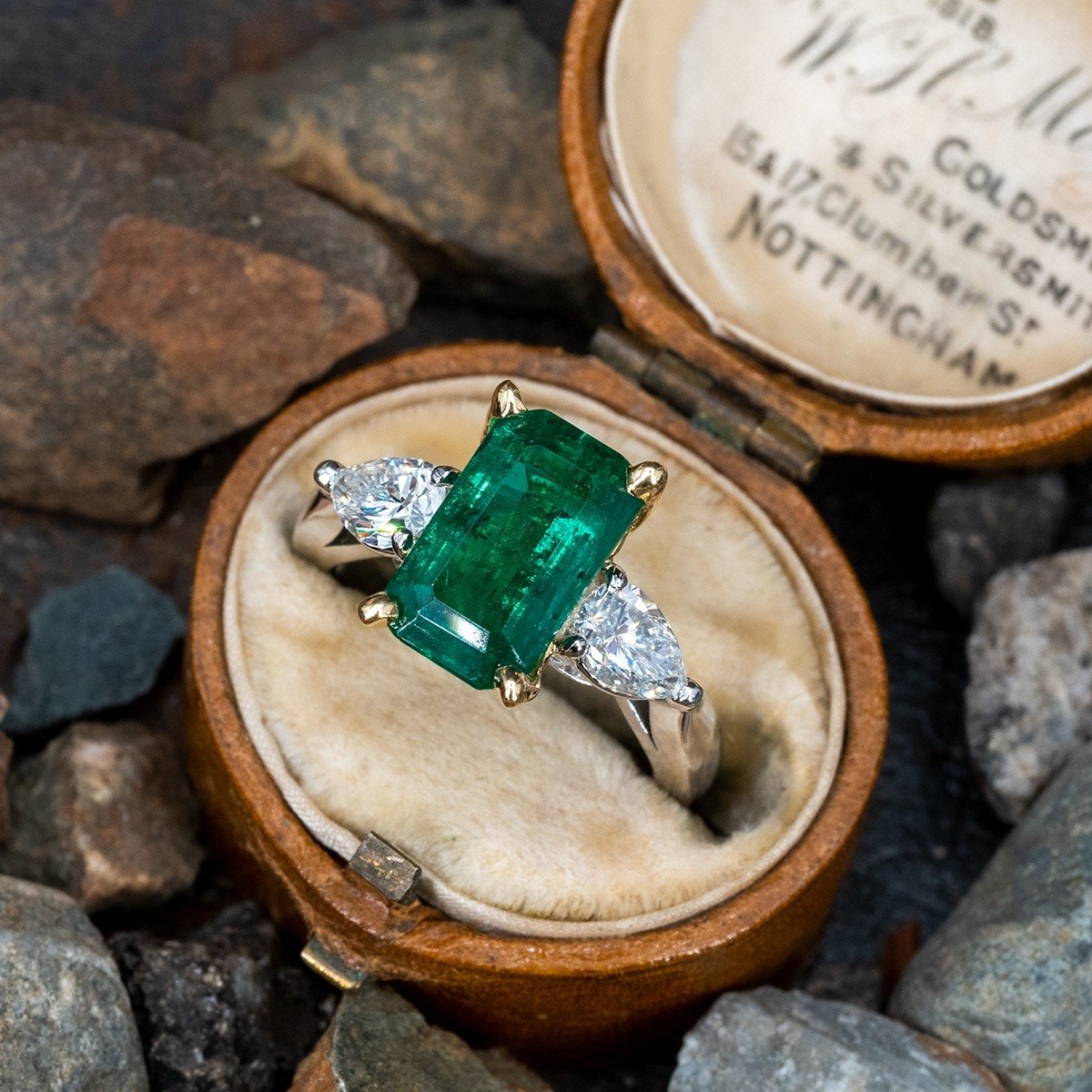 Stunning 5.4 Carat Emerald Ring w/ Pear Diamond Accents