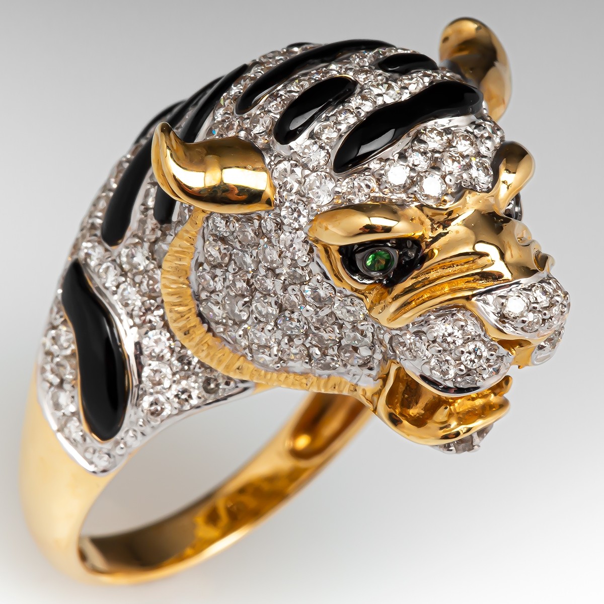 18K gold brilliant-cut diamond, ruby and emerald tiger ring. - Bukowskis
