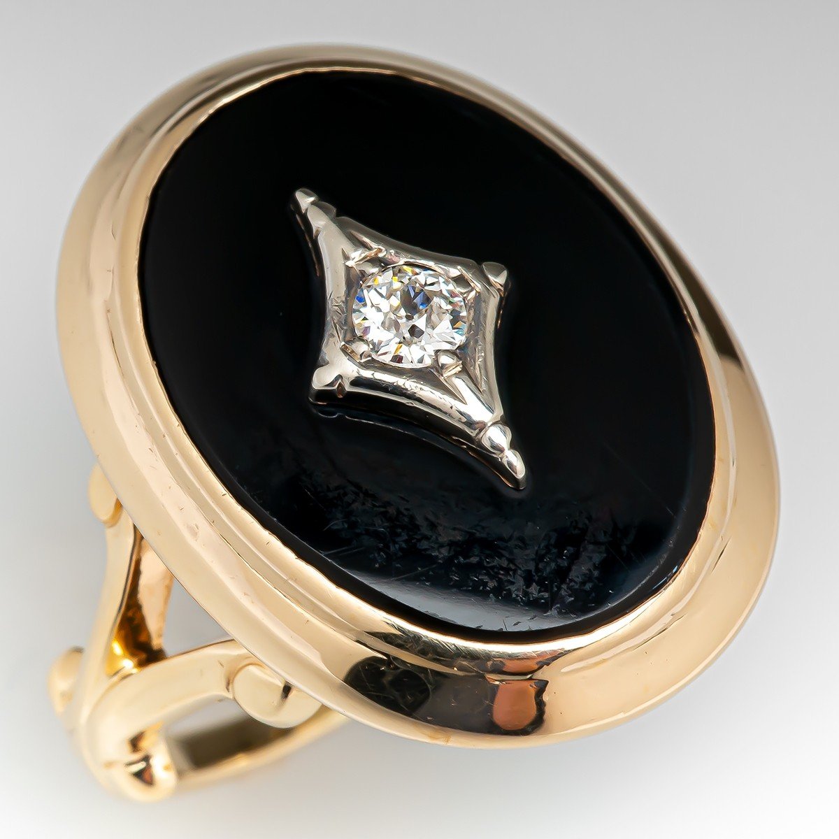 Onyx & Diamond Halo Vintage Engagement Ring
