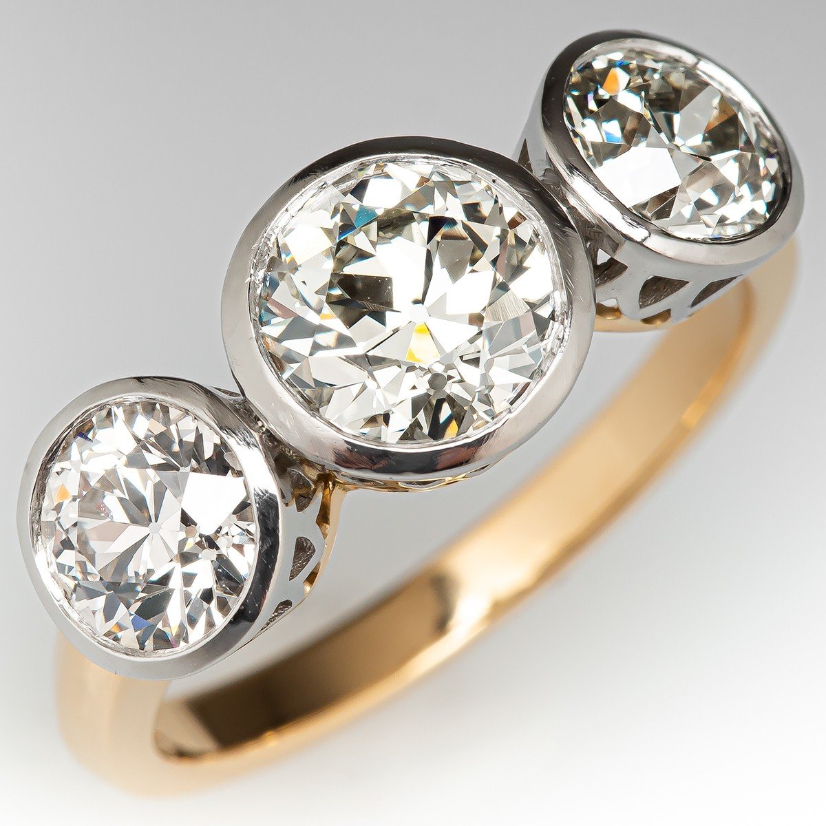 Fascinating Diamonds Bezel Round Cut 3 Stone Engagement Ring Yellow Gold