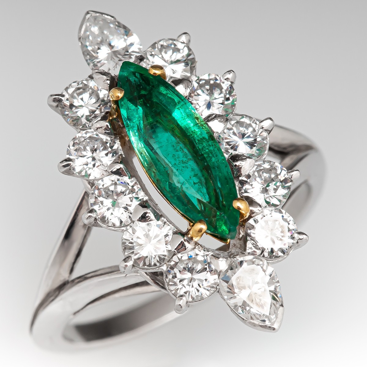 Marquise Cut Emerald Ring w/ Diamond Halo