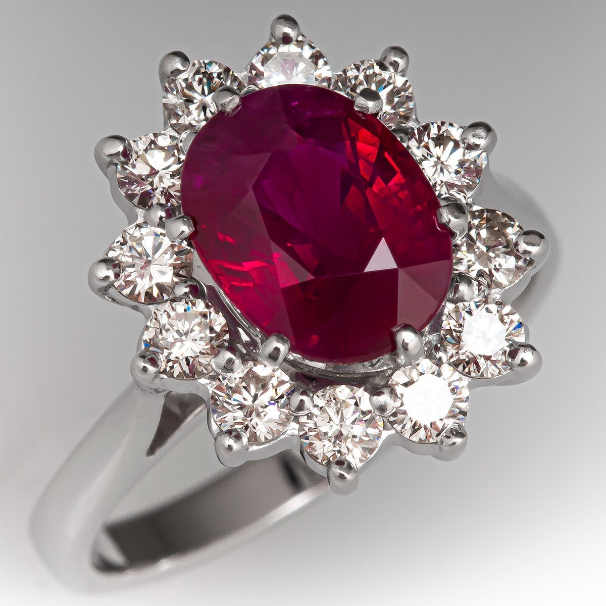 18K White and Rose Gold Oval Natural Ruby and Diamond Halo Ring 0.33tdw –  Simon Curwood Jewellers