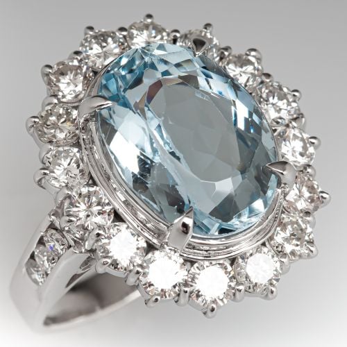 Oval Cut Blue Topaz Cocktail Ring w/ Diamond Halo Platinum