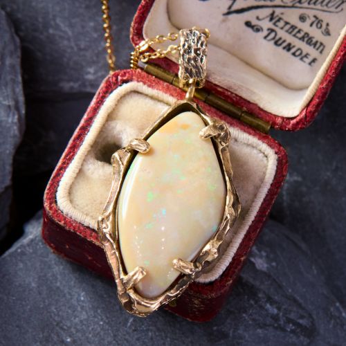 Circa 1970s Freeform Opal Pendant Necklace 14K Yellow Gold