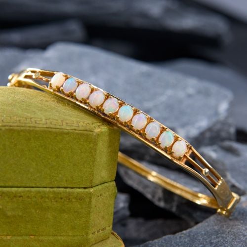 Fashionable Opal Hinged Bangle Bracelet 14K Yellow Gold