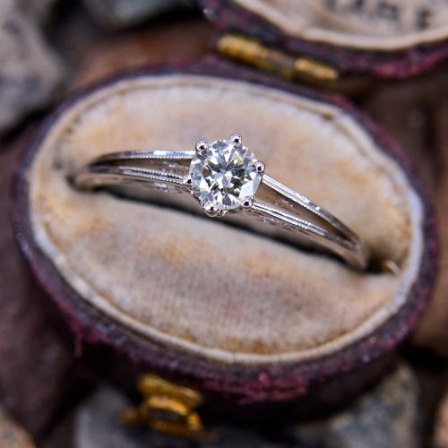 Delicate Solitaire Engagement Ring 18K White Gold 