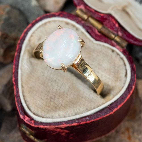 Oval Opal Cabochon Yellow Gold Ring