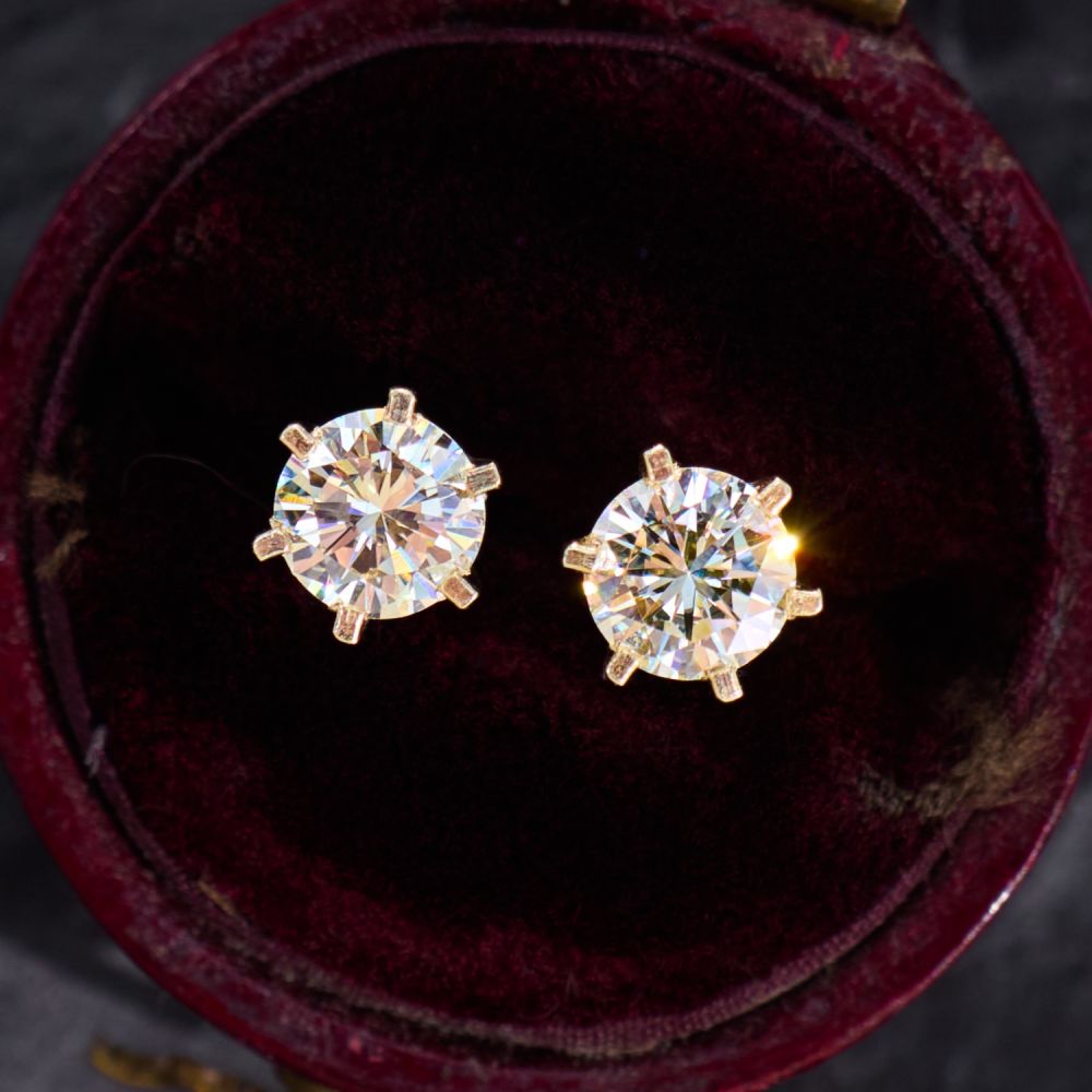 six prong setting carat earrings