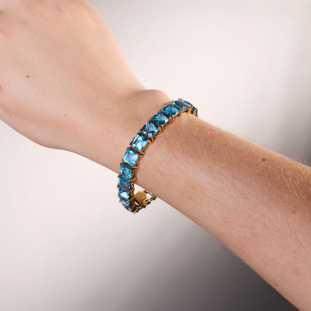 60 Carat Swiss Blue Topaz Tennis Bracelet 14K Yellow Gold