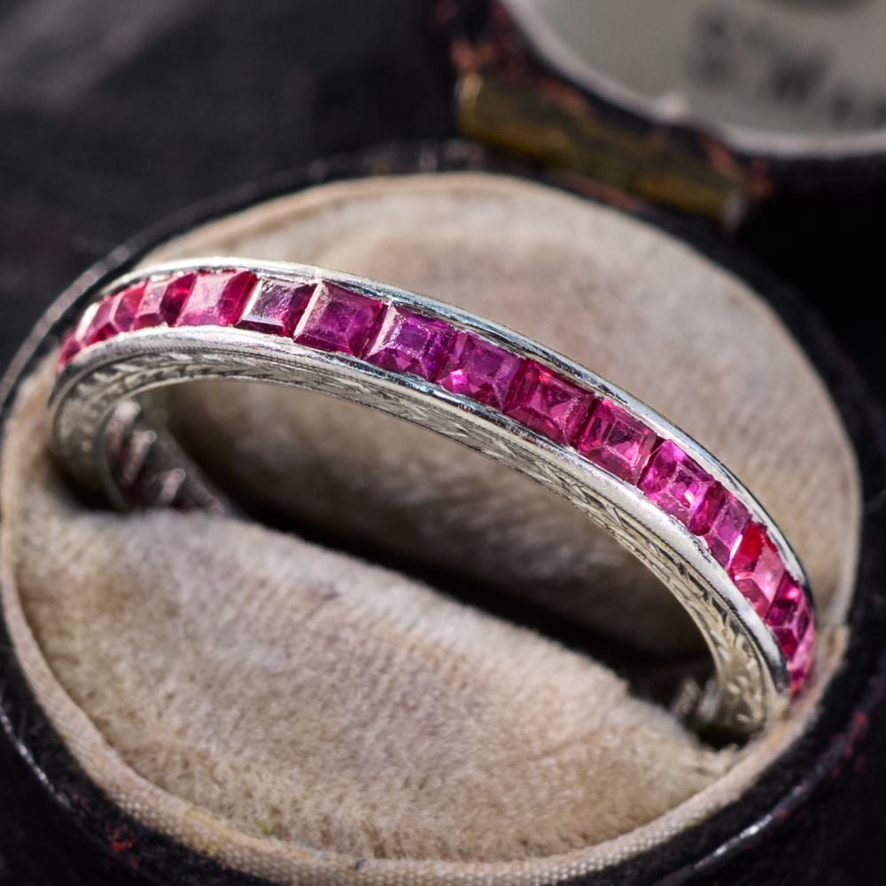 Square Cut Ruby Channel Set Eternity Band Ring in Platinum, Size 7