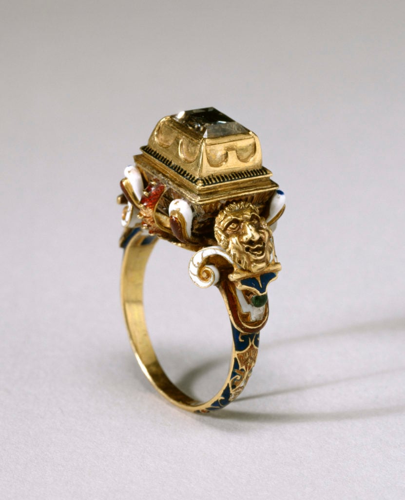 A table cut diamond surmounts an inverted pyramidal base on the top of this 16th century ring